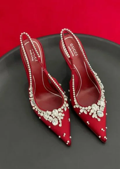 These are Gucci red crystal embellished...